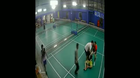 A young man playing Badminton, faceplants... due to a heart attack