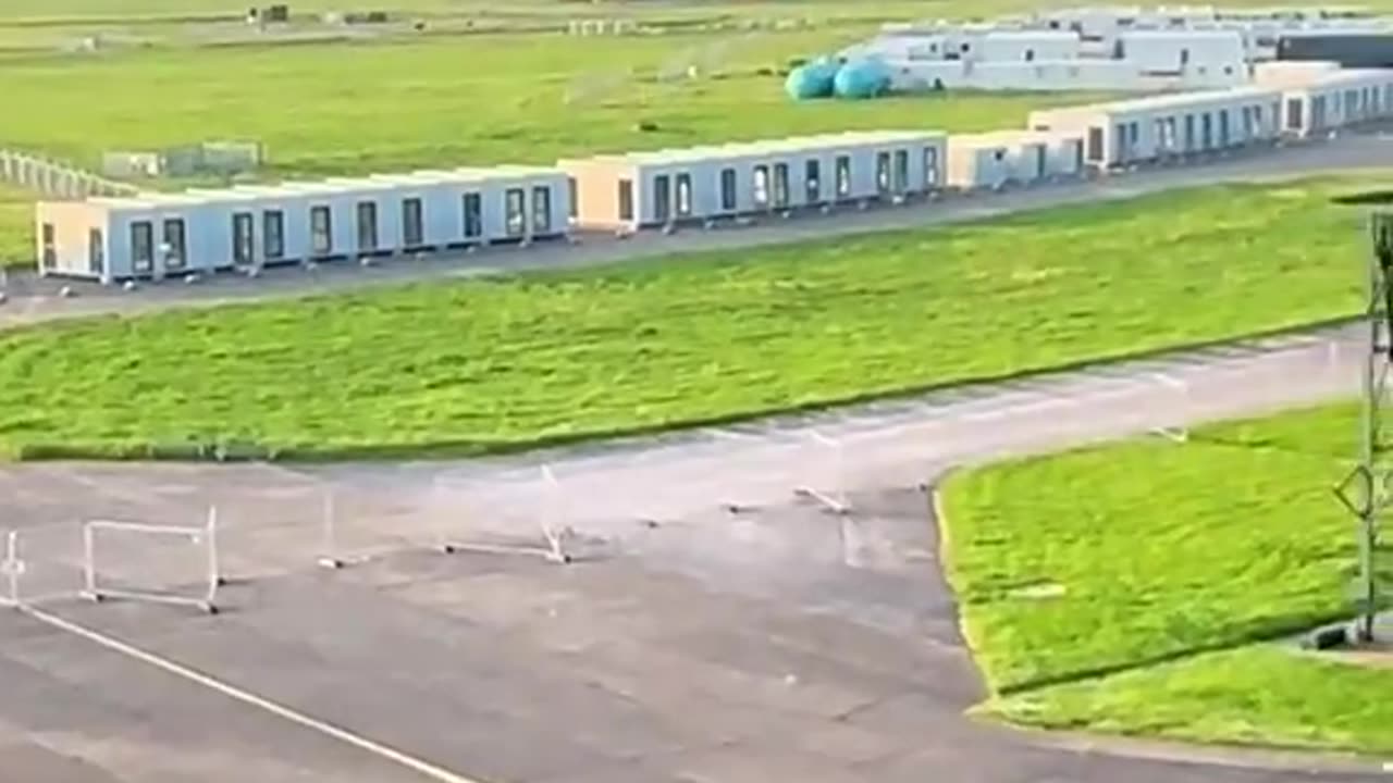 Man takes to the roof of grade II listed hanger at RAF SCAMPTON to give an