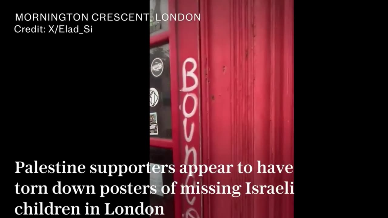 Palestine supporters are laughing while turning down posters of missing Israelis.