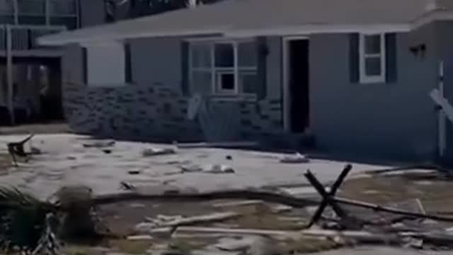 Fort Myers resident surveys damage to neighborhood in wake of Hurricane Ian