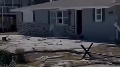 Fort Myers resident surveys damage to neighborhood in wake of Hurricane Ian