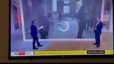 Sky News Shows Clip of “Bombed” Ukraine Building - Watch the Women Carrying the Stone