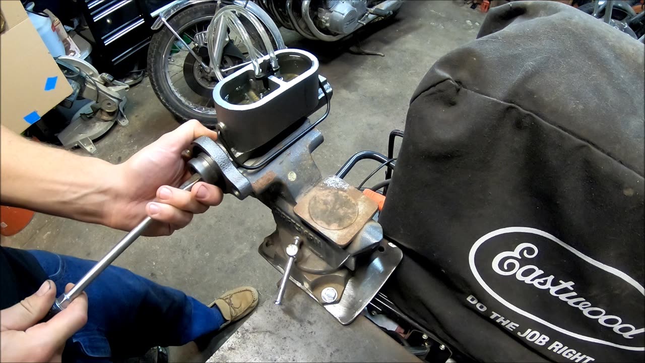 Bench bleeding a master cylinder
