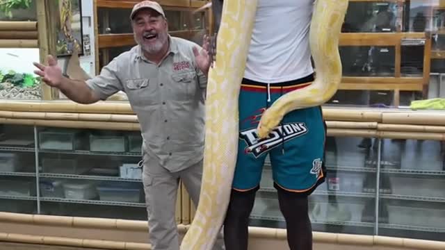 13_Super human awesome guy and a cool snake 😱