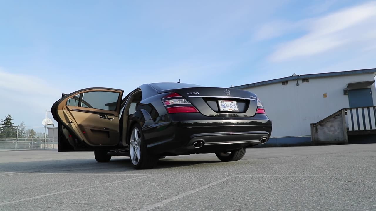 Black Car With Doors Open