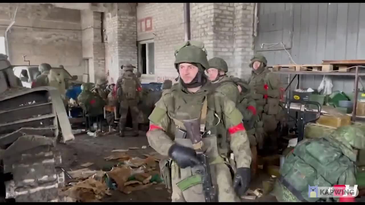 Soldiers of the sparta battalion prepare for the assault