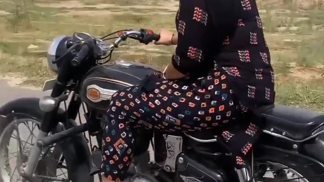 Video of girl riding a bullet bike