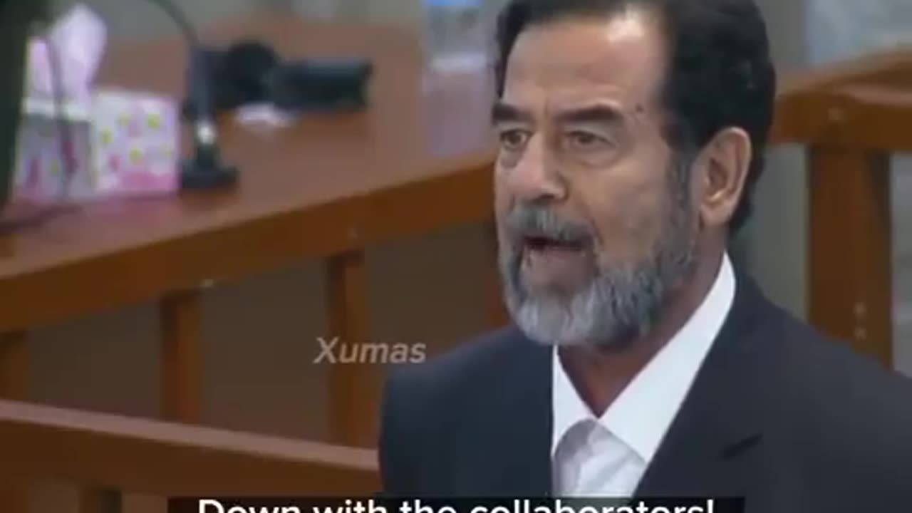 Saddam Hussein listens to his death sentence being handed down. November 5th, 2006