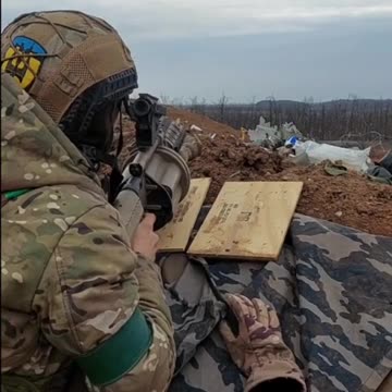 Ukrainian Firing Grenades into the Treeline