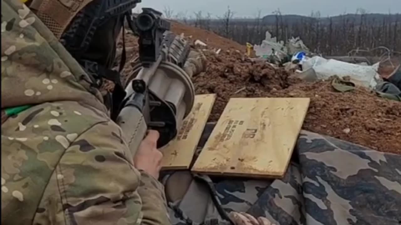 Ukrainian Firing Grenades into the Treeline