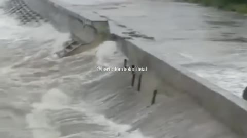 High Waves Hit the Embankment of Ampenan Beach, Lombok, Indonesia