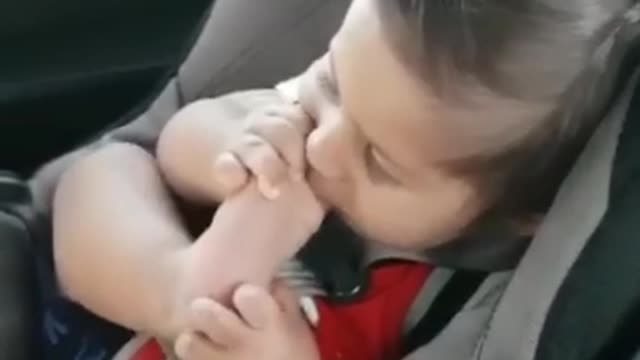 Baby loves sucking his BIG toe