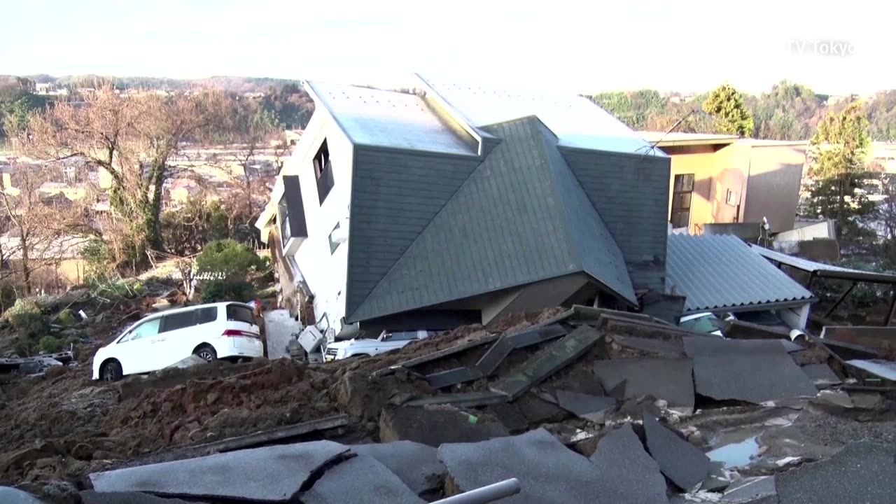 Japan PM says many still trapped under quake rubble