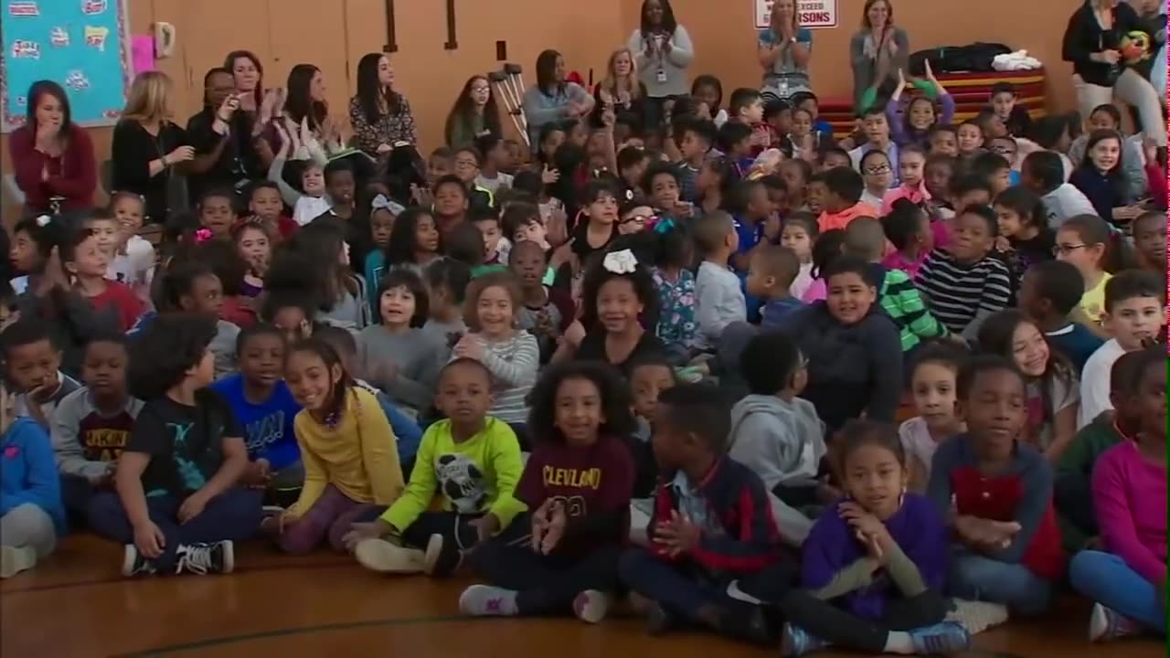 Airman surprises teacher mom during Long Island school assembly