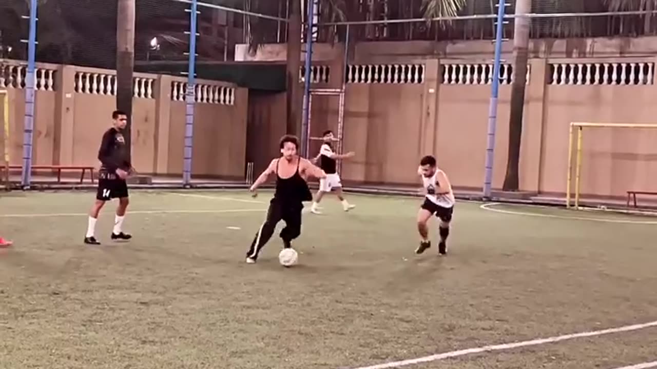 Tiger Shroff playing football