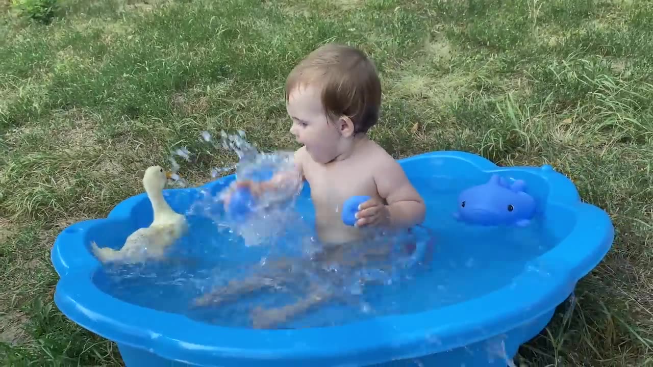 Funny cute Baby Swim with duck