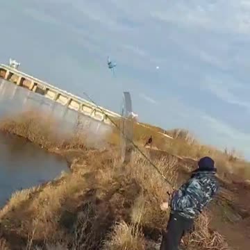 RUSSIAN PLAIN DODGING A FLOCK OF BIRDS, HIT A POWER LINE IN