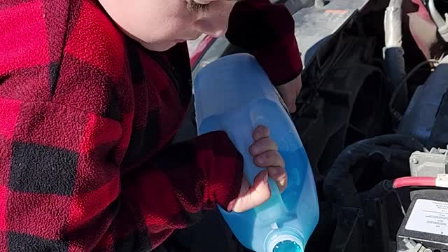 Son Learns to Fill Windshield Washer Fluid