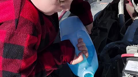 Son Learns to Fill Windshield Washer Fluid