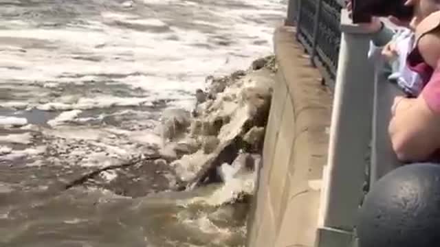 People Witness Drift Ice Pieces Crashing Into Riverfront In Russia