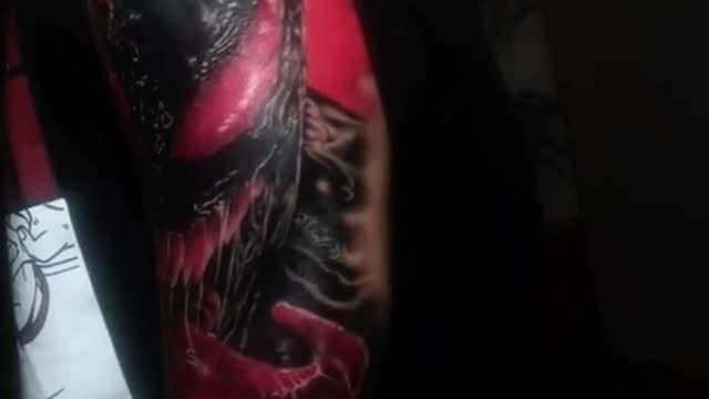 venom tattoo