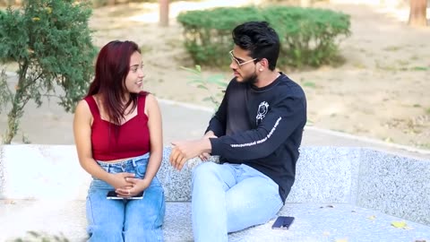 Extra hand touching cute girl
