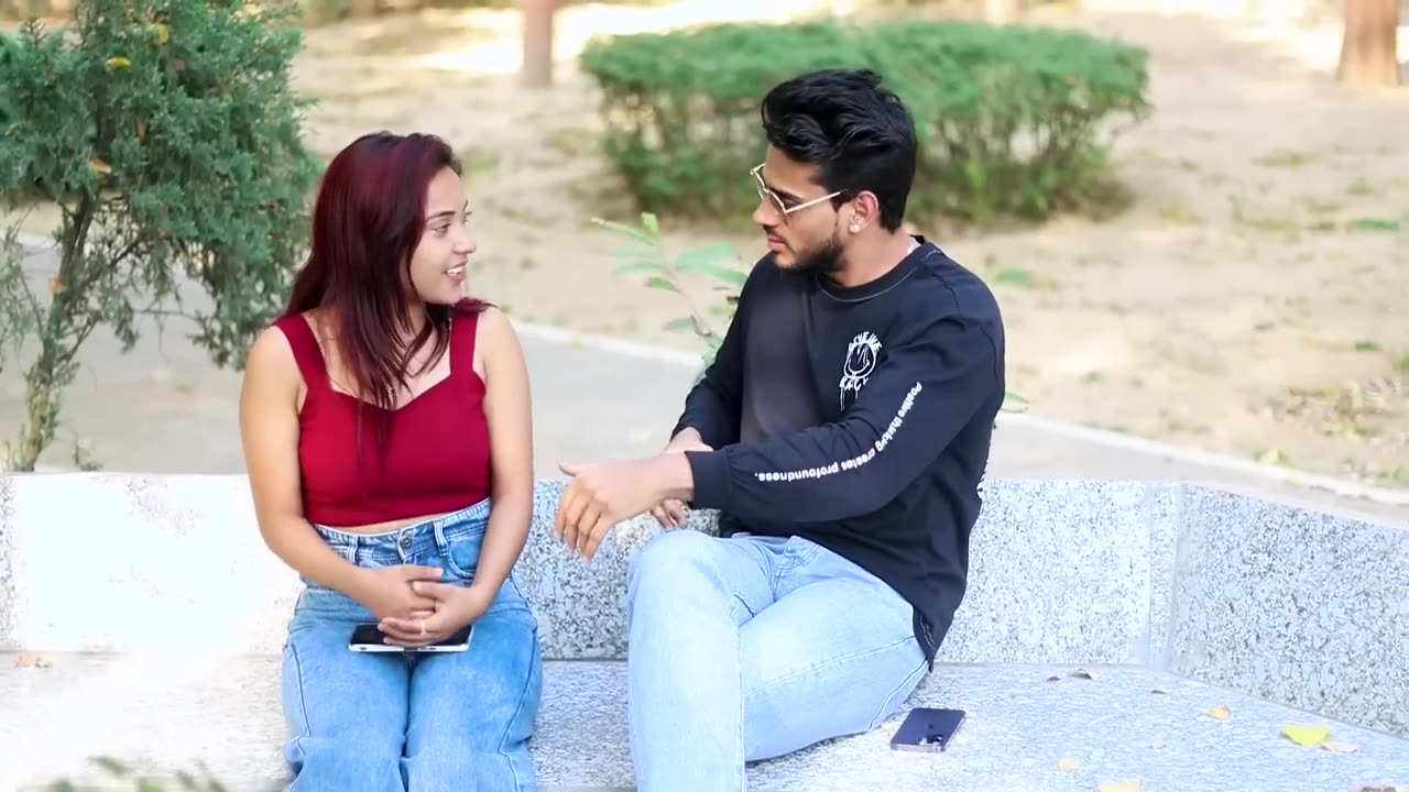 Extra hand touching cute girl