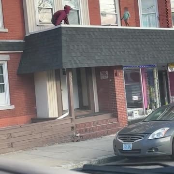 Man SPRINGS into action to rescue toddler on roof #shorts