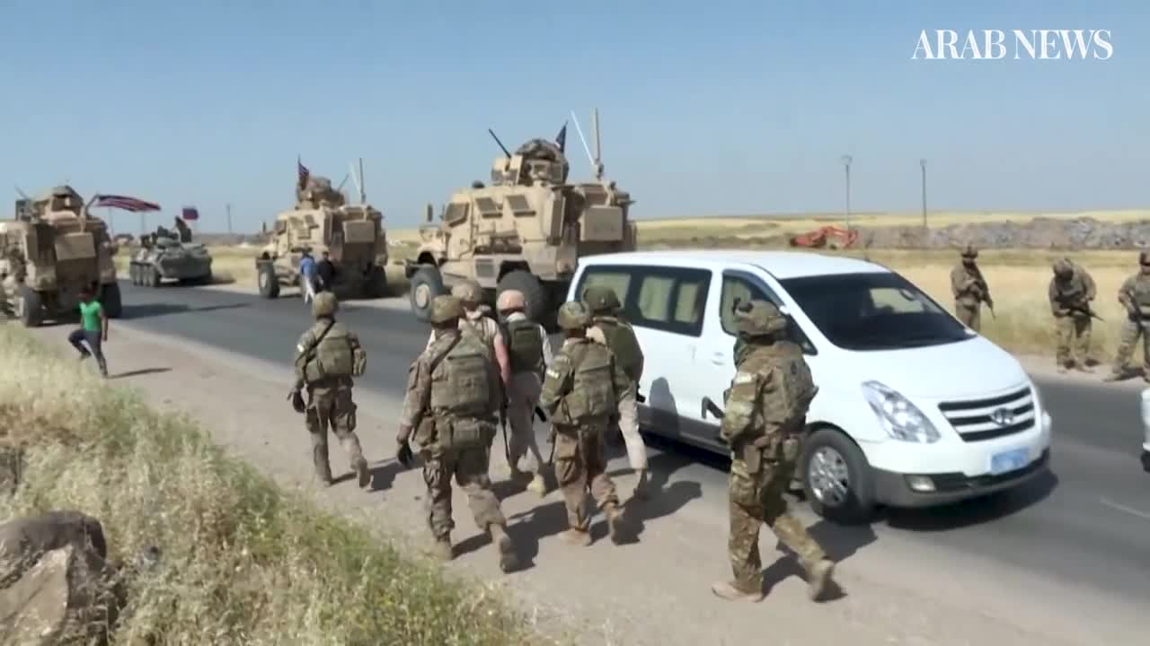 US and Russian military patrols seen on northeast Syria road