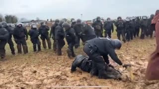 Environmental activists attacking the German police in Lutzerath.