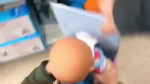 Toddler Refuses to Put Baby Doll Back