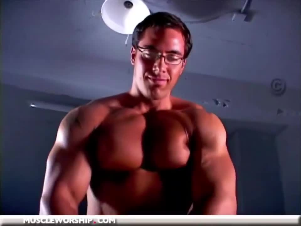 Muscular Man Taking Off His Shirt