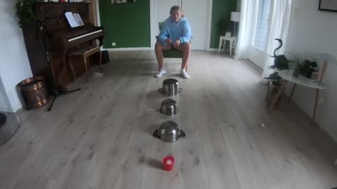 Ping Pong Bouncing On Kitchen Pots And Goes Into The Cup