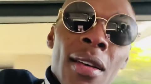 Israel Adesanya reacts to his loss against Sean Strickland at UFC 293