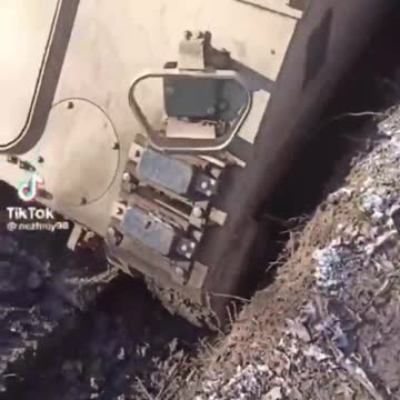 Ukraine solider shows American military vehicle stuck