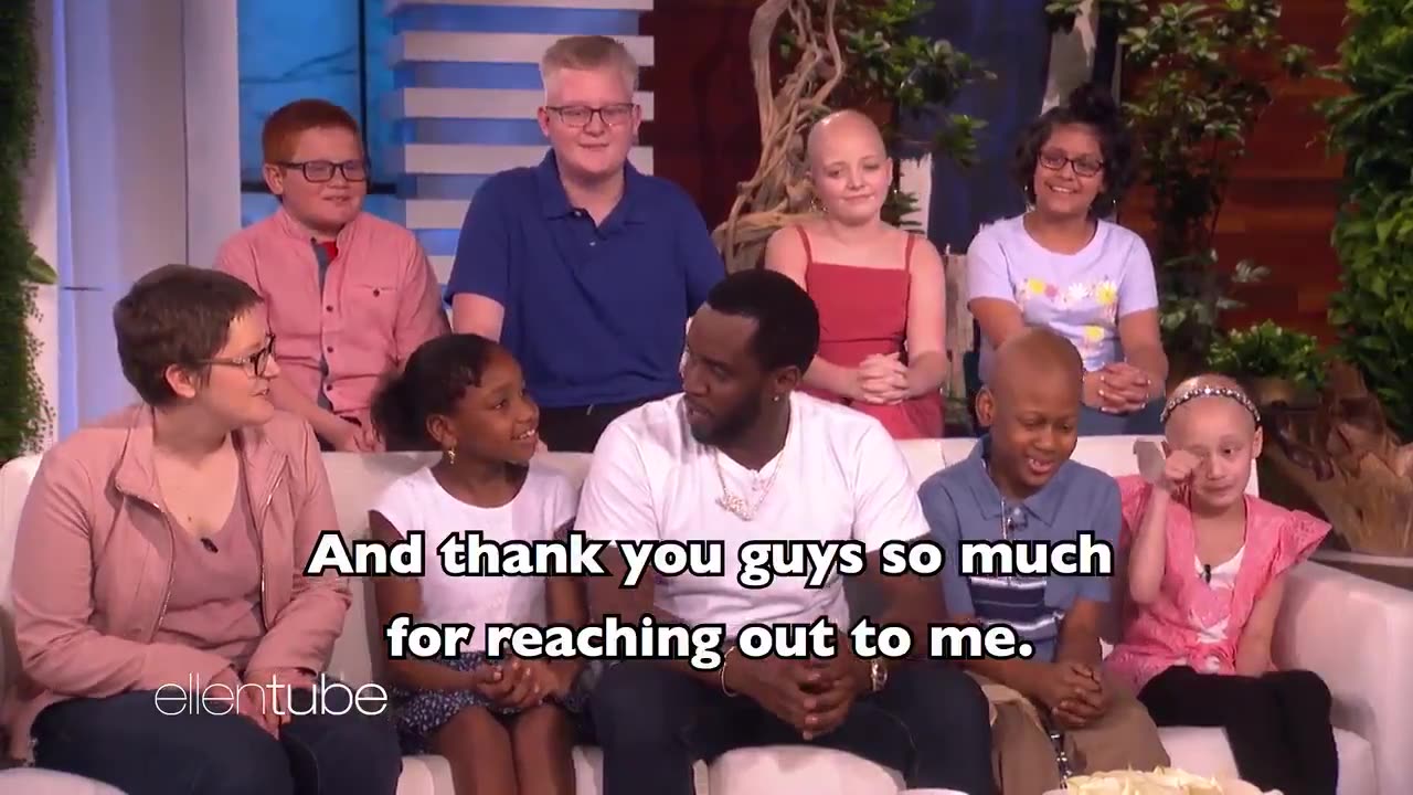 Ellen DeGeneres introducing a group of kids to Diddy…. WTF!?!