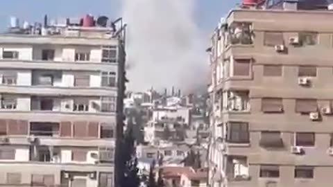 The aftermath of explosions in the suburb of Western Mezzeh Villas in Damascus