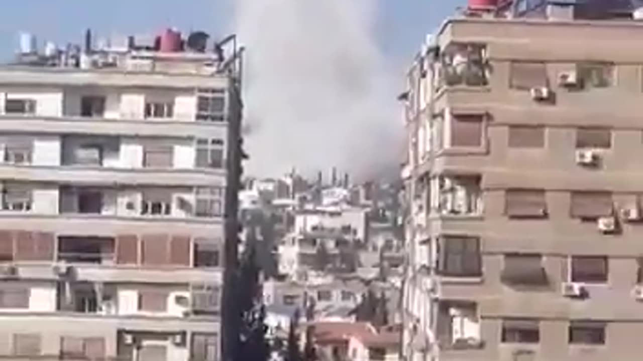 The aftermath of explosions in the suburb of Western Mezzeh Villas in Damascus