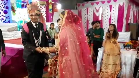 Wedding couple dance in reception function