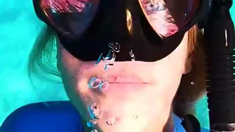 Divers Blow Bubble Rings