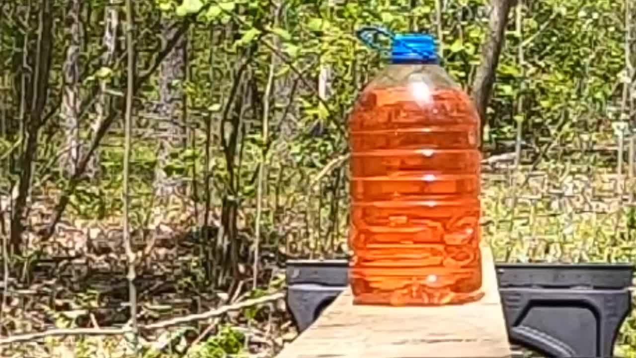 Slo-mo shooting a water bottle