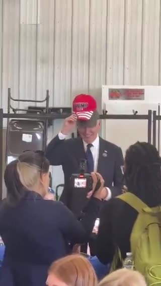 MUST WATCH: BIDEN WEARS TRUMP HAT