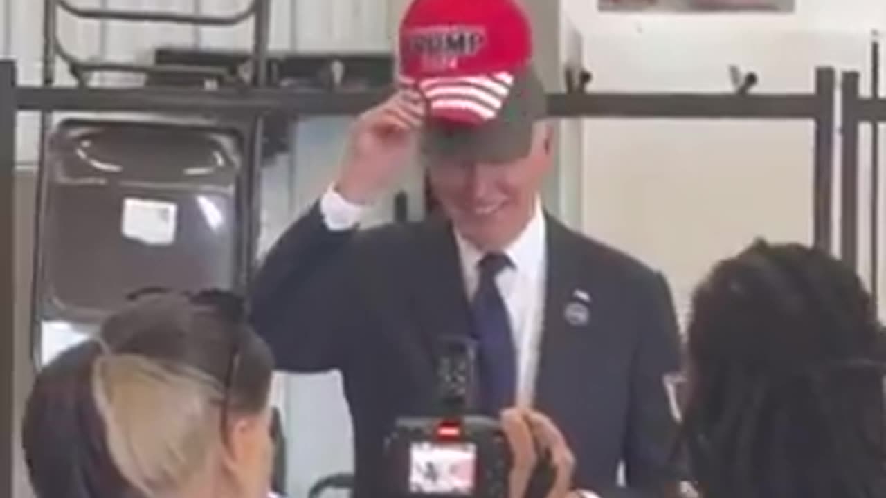 MUST WATCH: BIDEN WEARS TRUMP HAT