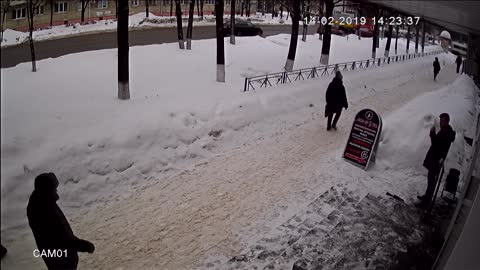 Ice Block Miraculously Misses Pedestrian