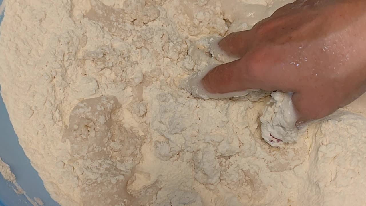 Combining the ingredients for yeast dough