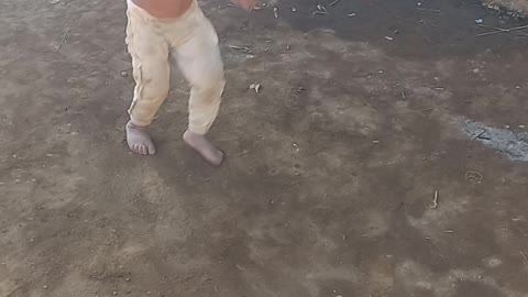 A Village Child's Reaction to Camera