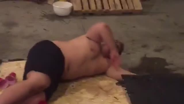 Shirtless guy jumps onto wooden beer pong table and snaps it