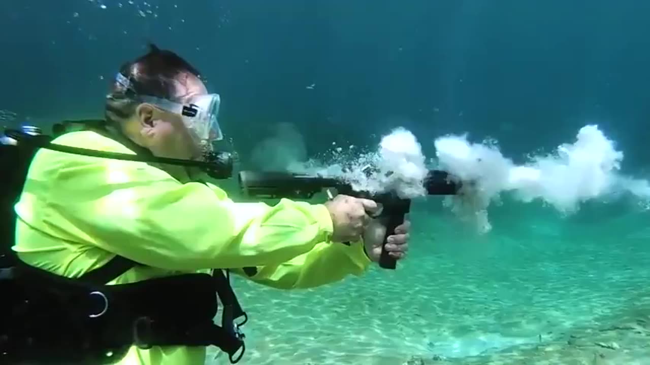 Firing a submachine gun underwater