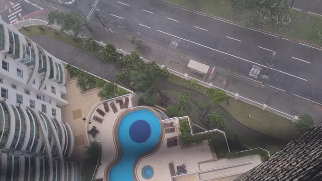 Storm Pushes Water Tank from 24-Story Building