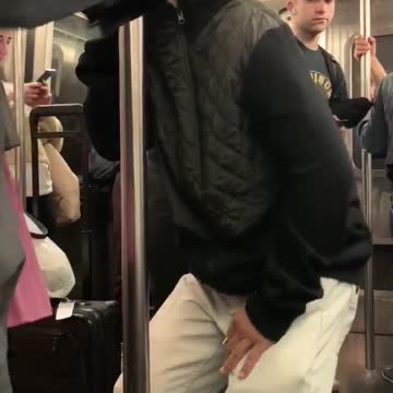 Old guy bald dancing subway pole